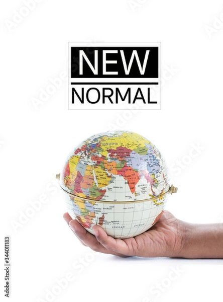 Obraz NEW NORMAL text on Globe in hand isolated on white background