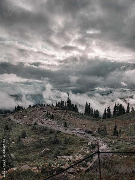 Fototapeta clouds in the mountains