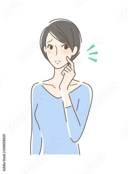 Fototapeta 頬をつんつんしてがっかりする女性