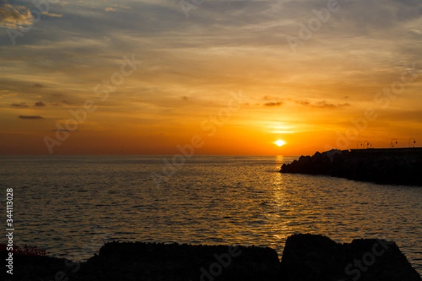 Fototapeta Beach with glossy surface reflecting beautiful seascape on the sunset on Gran Canaria island
