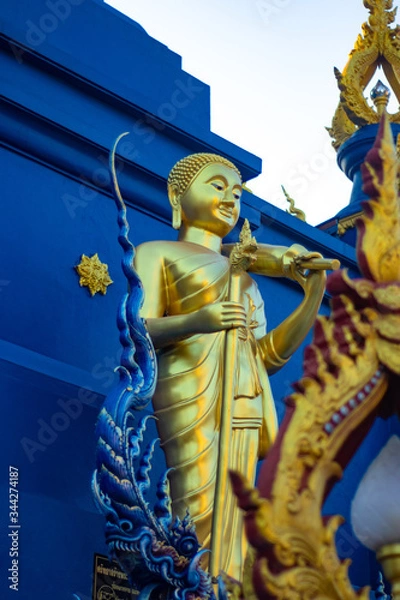 Fototapeta A beautiful view of Wat Rong Suea Ten, the Blue Temple at Chiang Rai, Thailand.