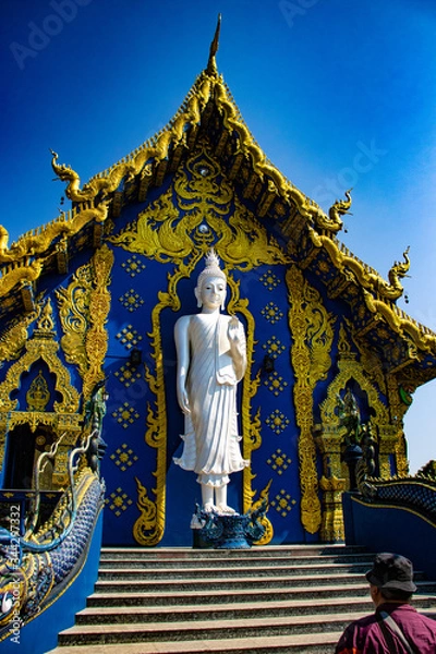 Fototapeta A beautiful view of Wat Rong Suea Ten, the Blue Temple at Chiang Rai, Thailand.