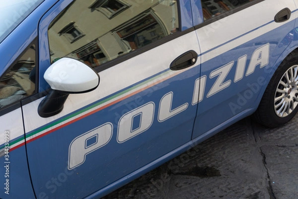Fototapeta Polizia sign on a Italian police car in Florence, Tuscany, Italy, Europe