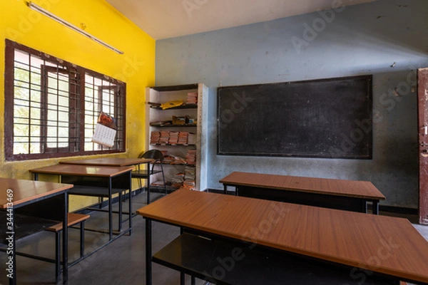 Obraz Empty classroom with desks in Indian school
