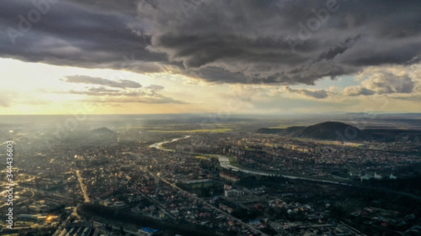 Obraz Storm clouds in city