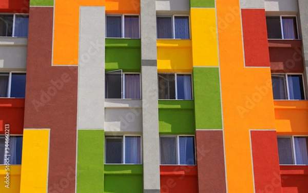 Obraz Colored building wall with apartment windows