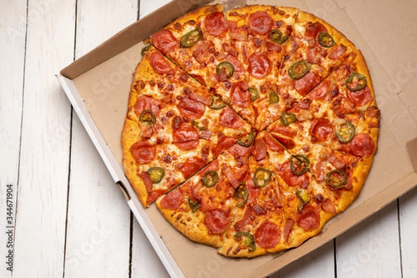 Obraz Mexican pizza with jalapeno pepper and bacon on white background