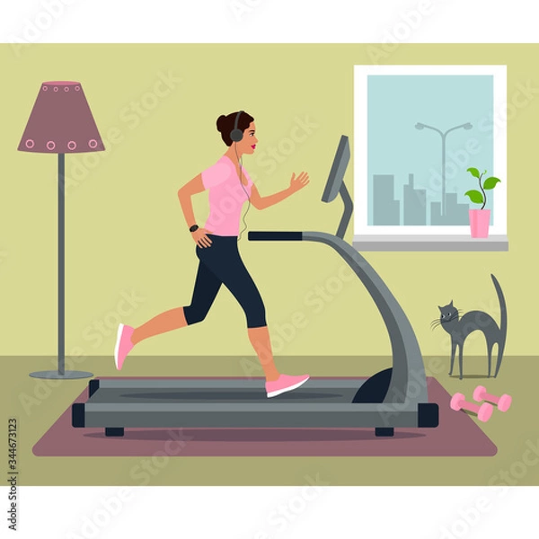 Obraz woman running on treadmill in headphones at home