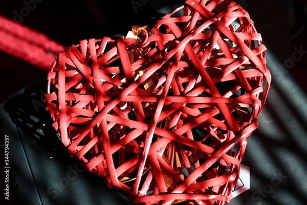 Obraz red heart on black background