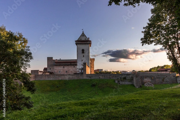 Fototapeta Estonia, Narva. Majestic medieval castle on the banks of the river. Border control for travelers. Customs Tourism