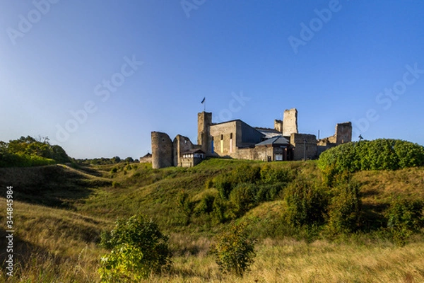 Fototapeta Rakvere, Estonia, Europe. The ruins of the famous medieval knight's castle in Rakvere. Castle famous place and tourist destination in Estonia