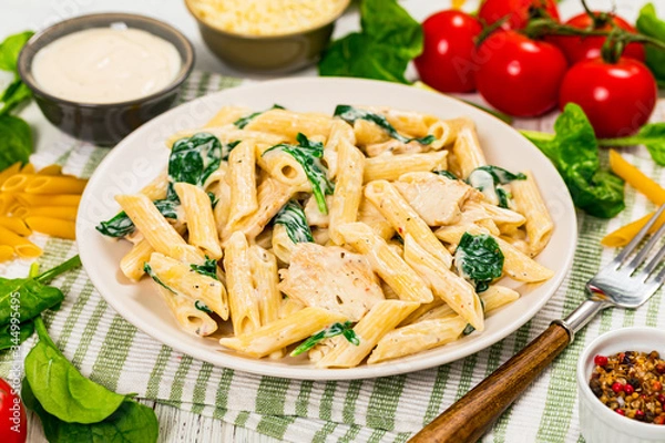 Obraz Chicken Alfredo Pasta with Spinach. Selective focus.