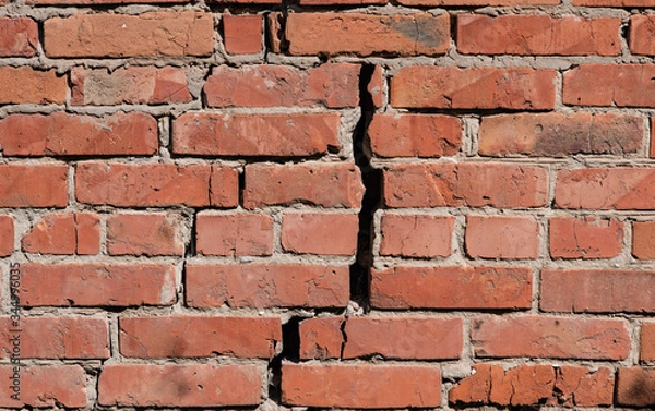 Obraz Old red brick wall with a big crack in the middle