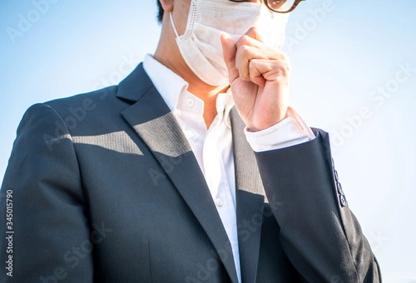 Obraz 咳をするビジネスマン