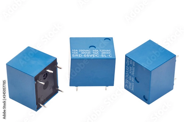 Obraz small electromagnetic relays isolated on a white background