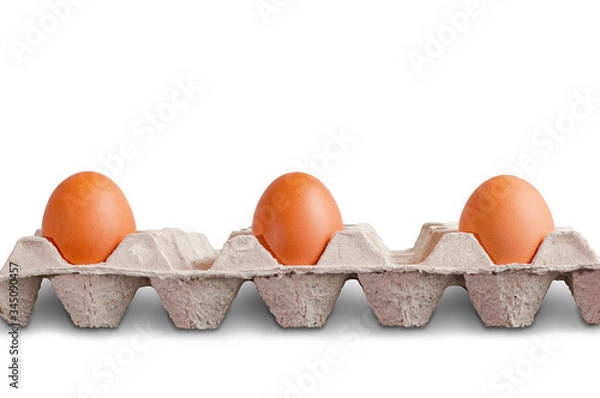 Fototapeta Three eggs in egg carton with distance , no social distancing ,  on white background with clipping path