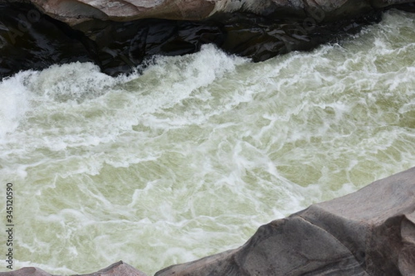 Obraz Wild River flowing between Rocks