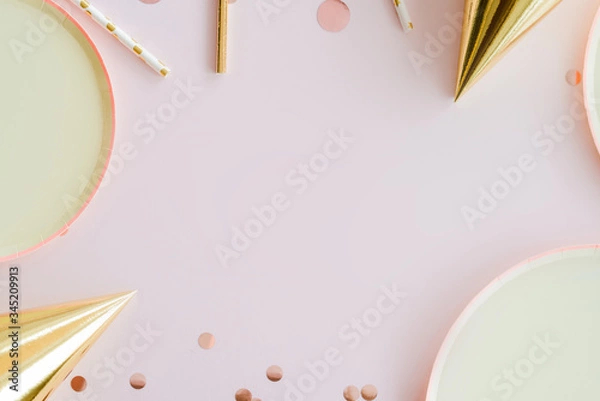 Fototapeta frame of birthday party supplies. dusty pink background