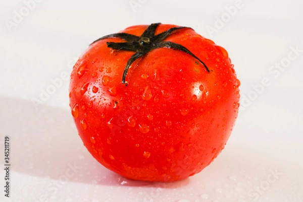 Fototapeta Fresh organic tomatoes with dew drops isolated on white background