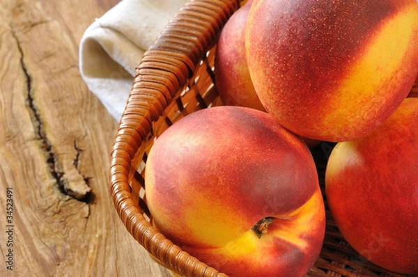 Obraz Basket of peaches, close-up