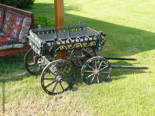 Fototapeta old carriage in the park