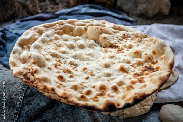 Obraz Preparation of organic tandoor bread and layered bread, one of the local flavors of Antioch