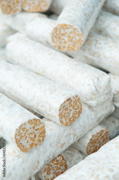 Fototapeta Tempe or Tempeh, Indonesia food from soybeans sell in the traditional market 