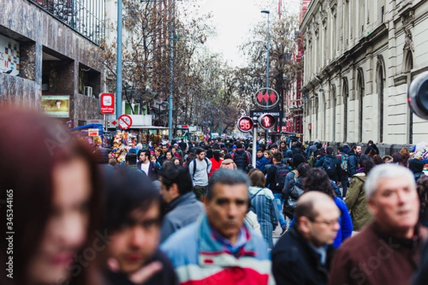 Obraz Crowded street on a cloudy day