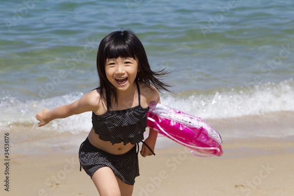 Obraz 海水浴を楽しむ女の子