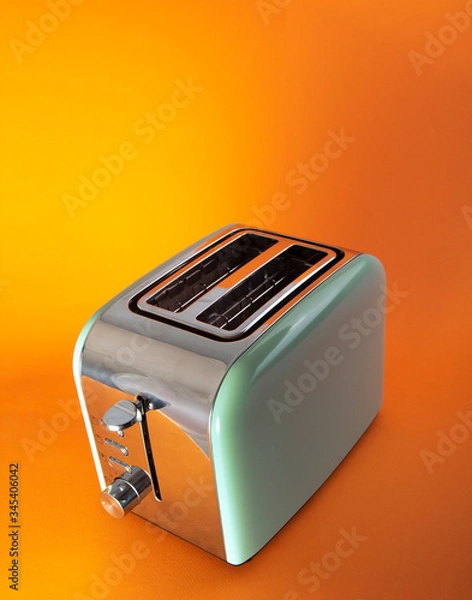 Fototapeta Classically retro Styled Two Slot 2 Slice Toast Maker. Domestic and Home Electric Kitchen Appliances