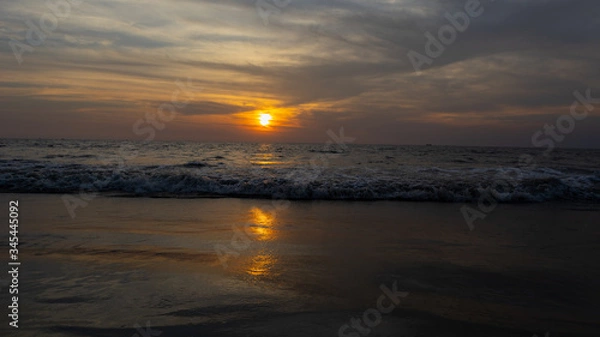 Fototapeta sunset over the beach
