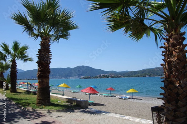 Fototapeta FETHIYE, TURKEY - June, 2019: Calis Beach on the Aegean Sea