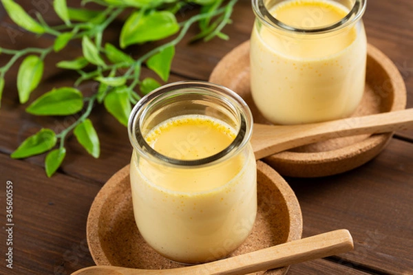 Obraz Homemade pudding on woode background - 手作りプリン