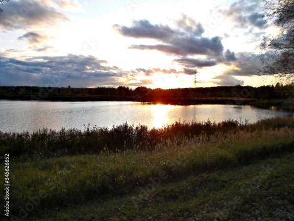 Fototapeta sunset over lake