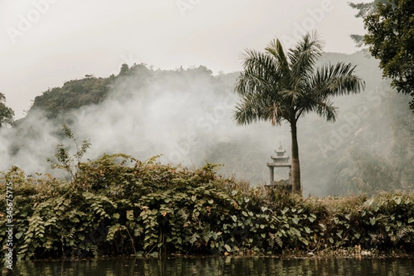 Fototapeta 
Landscape of Karst formation in the water along the Ngo Dong River at the Tam Coc National Park, Ninh Binh Province, Vietnam. Most spectacular scenery in Vietnam's.