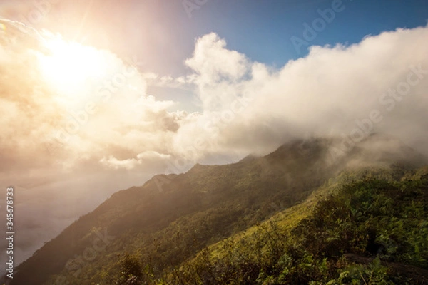 Fototapeta Beautiful of multiple mountains valley at sunrise in the morning at Phu chi Duen, Chiang Rai Province, Thailand