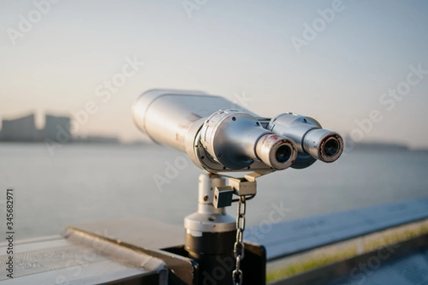 Obraz telescope with city skyline