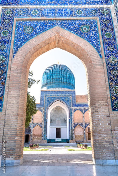 Fototapeta The main entrance gate of the old ancient uzbek tomb - Amir Temur maqbarasi, Go‘ri Amir in Uzbekistan.
