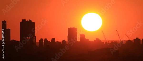 Obraz Zachód słońca  nad miastem, Williamsburg NY
