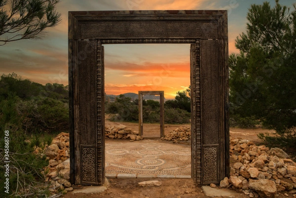 Fototapeta The gates of Llentia at dawn in Ibiza