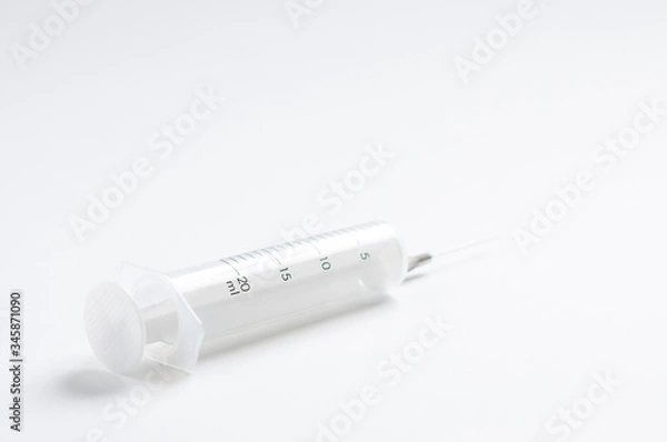 Obraz Empty syringes and needles on white background in studio, Covid-19