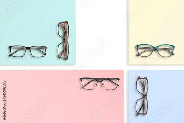 Fototapeta Composition of many different classic style glasses on square stands of different colors.