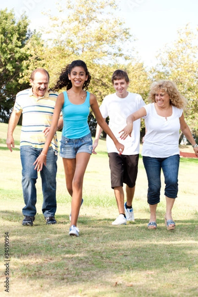 Fototapeta Family having fun in summer park