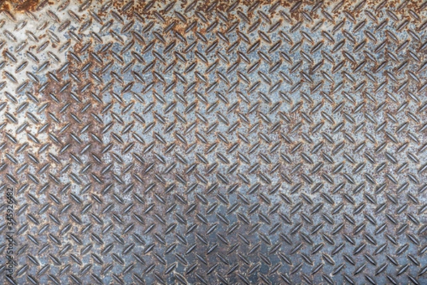 Fototapeta Old and rusted Metal diamond plate pattern texture, background