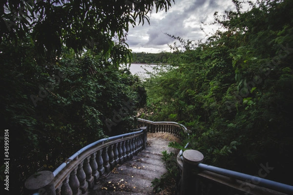 Fototapeta stairs leading down to secret beach in the Philippines 