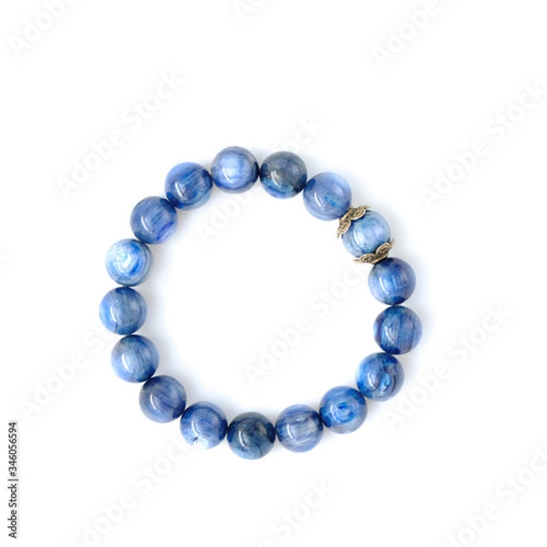 Fototapeta Lapis Lazuli gem or blue rock bracelet or wristband isolated on white background, accessories for the wrist.