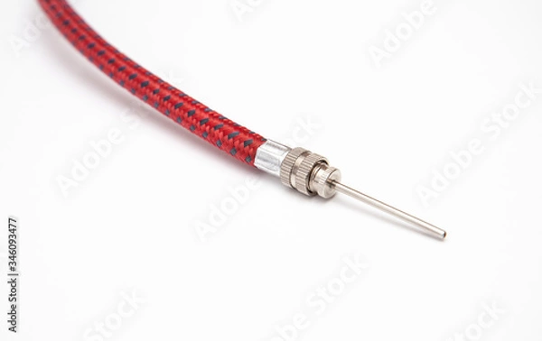 Obraz Bicycle pump needle on white background
