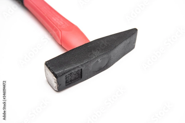 Obraz hammer with a red handle on a white background