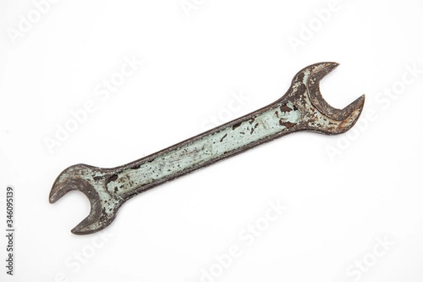 Fototapeta old spanner on a white background