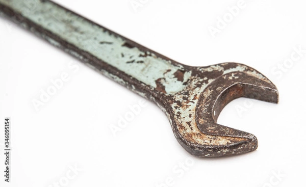 Fototapeta old spanner on a white background